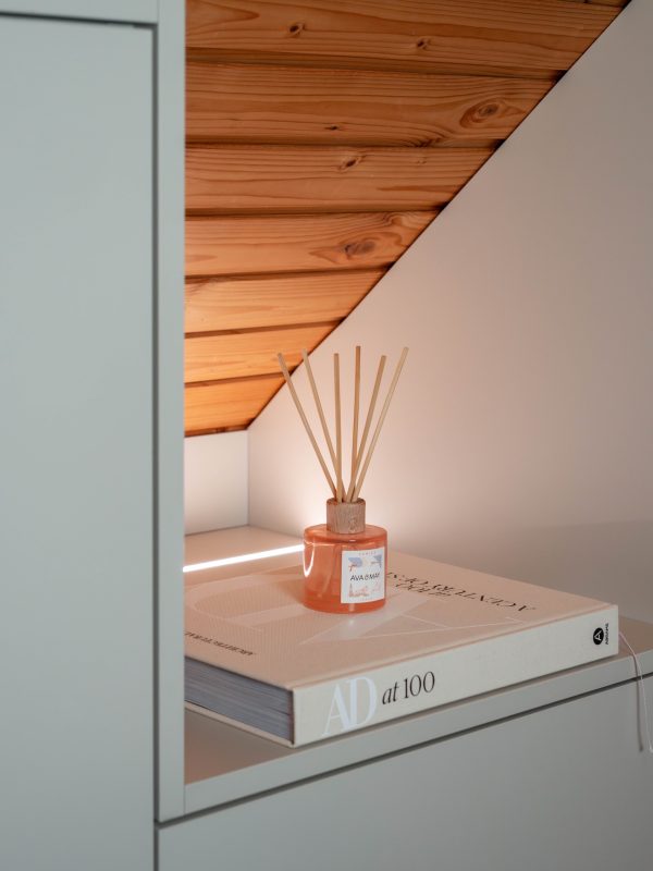 Light Beige Walk-In Closet Niche with LED Lighting for Decorative Purposes