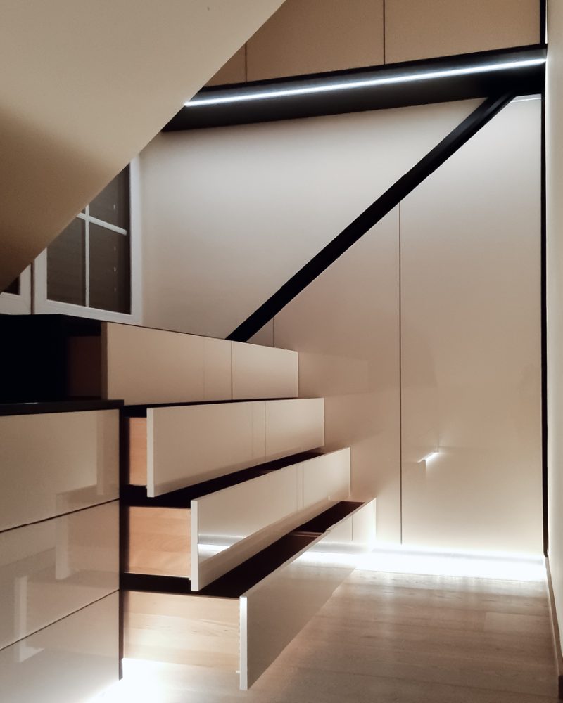 Dressing room white high gloss with sloping ceiling cupboard LED baseboard