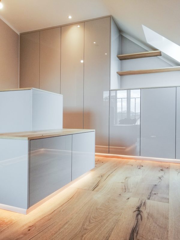 Elegant wardrobe in high-gloss white
