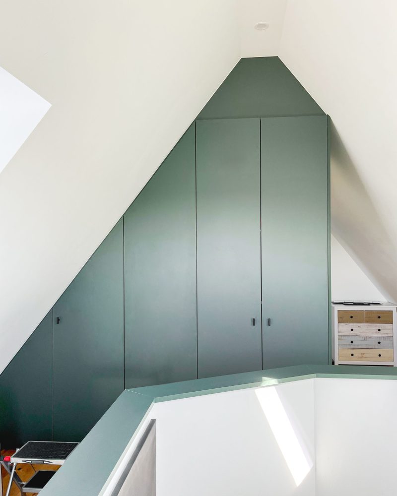 Sloping roof cupboard in green