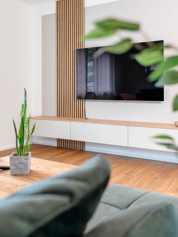 Floating sideboard in light beige with wall panels