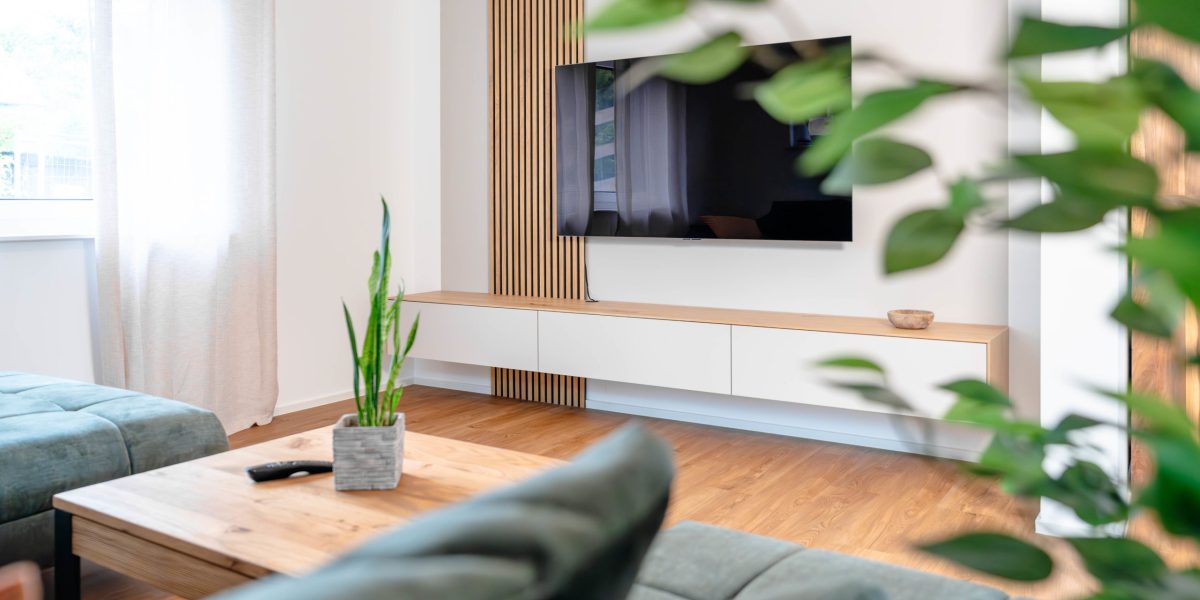 Floating sideboard in light beige with wall panels
